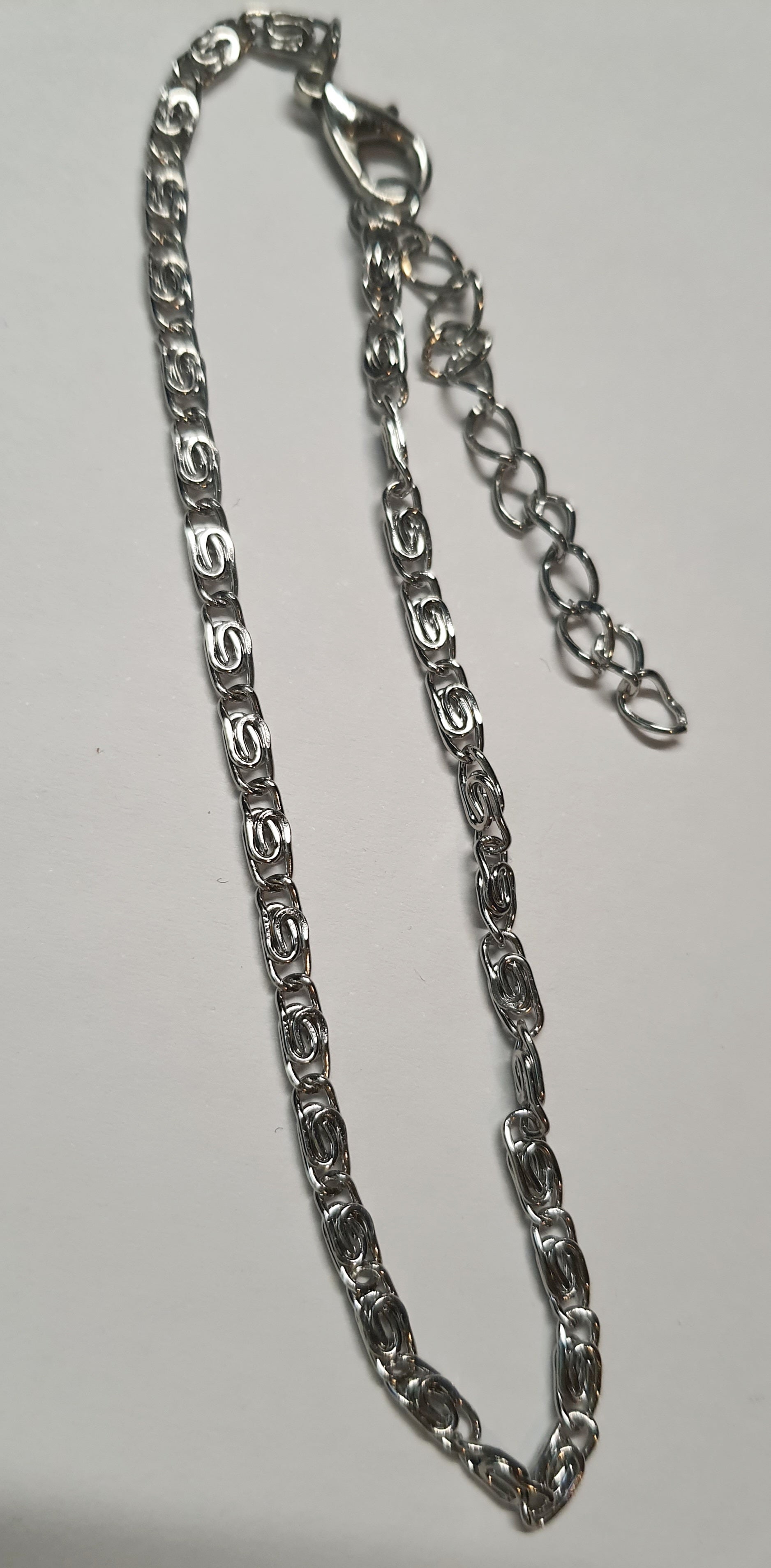 Srebrna bransoletka o splocie ślimak, stal chirurgiczna, stal nierdzewna, wodoodporne, hipoalergiczne, jakość premium, długość regulowana 21–28 cm, RougeBizu.