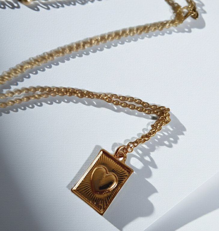 Rose Cross – Gold necklace with pink crystals and a Mary medallion