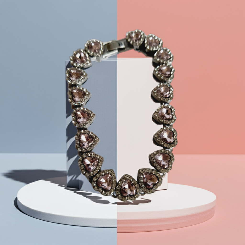 Bransoletka ze stali nierdzewnej, długość 20 cm, zdobiona różowymi kryształami w kształcie serca i cyrkoniami, RougeBizu.