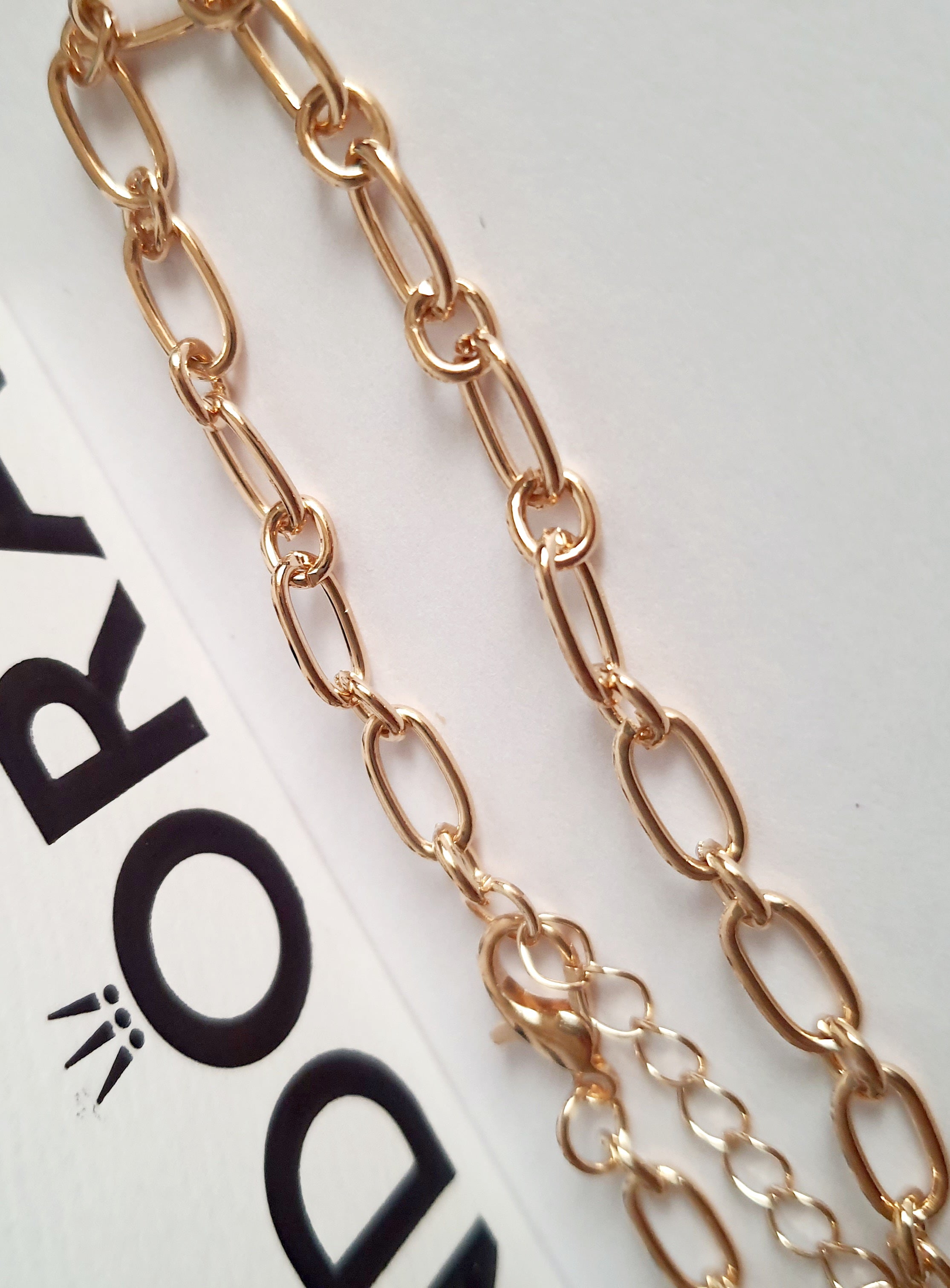 Złota bransoletka w splocie ogniwa, długość 23–28 cm, stal chirurgiczna, stal nierdzewna, wodoodporne, hipoalergiczne, jakość premium, elegancki połysk, Rouge Bizu.