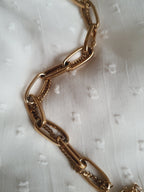 Bransoletka damska/unisex ze stali nierdzewnej, długość regulowana 17–21 cm, złota, duże geometryczne ogniwa połączone z drobnym łańcuszkiem, nowoczesny styl glamour, Rouge Bizu.