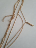Rose Cross – Gold necklace with pink crystals and a Mary medallion
