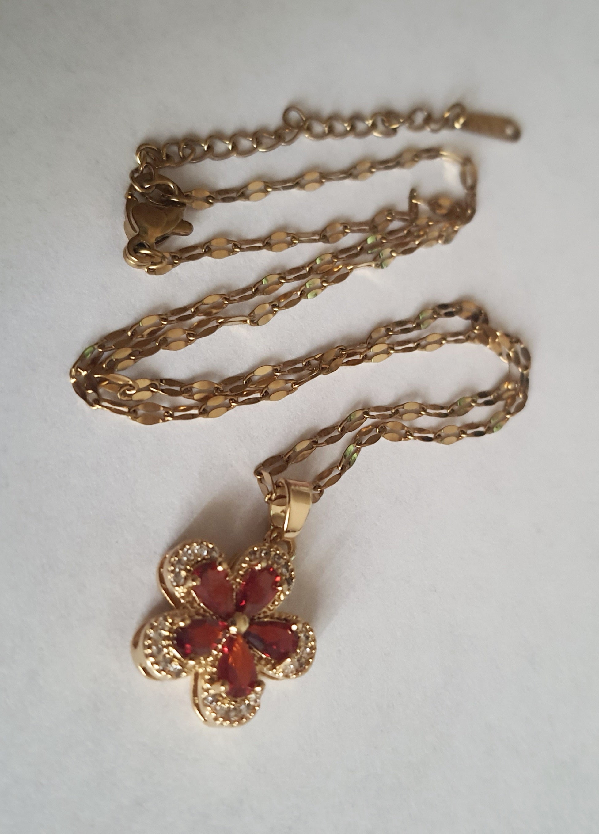 Rose Cross – Gold necklace with pink crystals and a Mary medallion