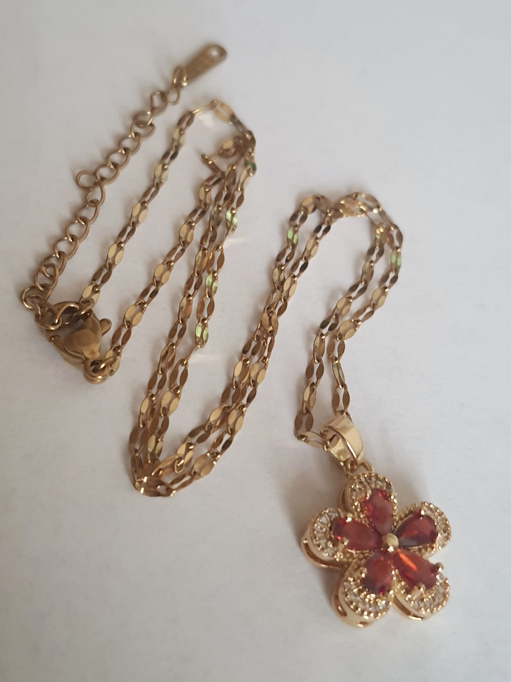Rose Cross – Gold necklace with pink crystals and a Mary medallion