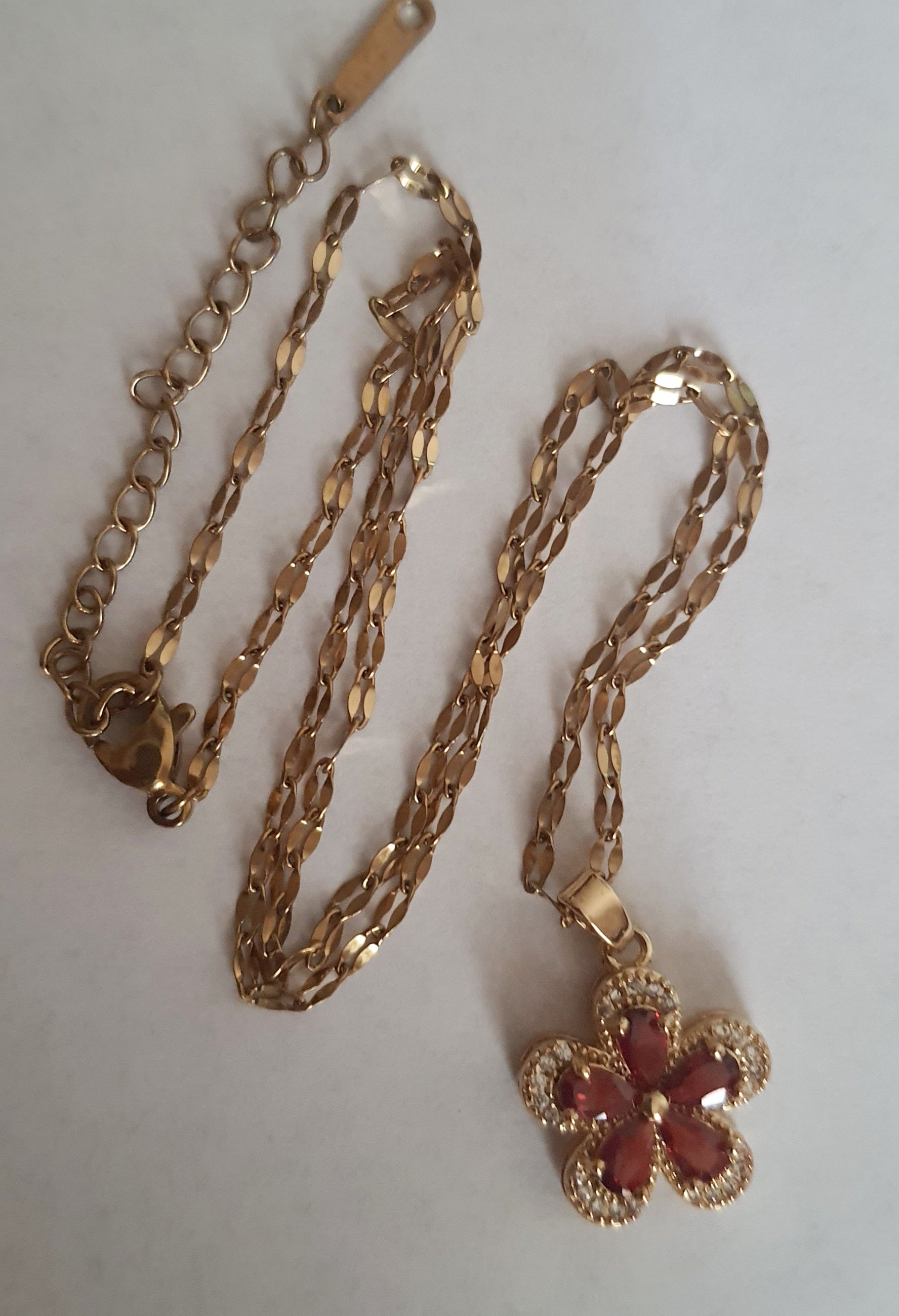 Rose Cross – Gold necklace with pink crystals and a Mary medallion