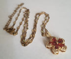 Rose Cross – Gold necklace with pink crystals and a Mary medallion