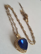 Rose Cross – Gold necklace with pink crystals and a Mary medallion