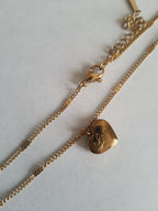 Rose Cross – Gold necklace with pink crystals and a Mary medallion