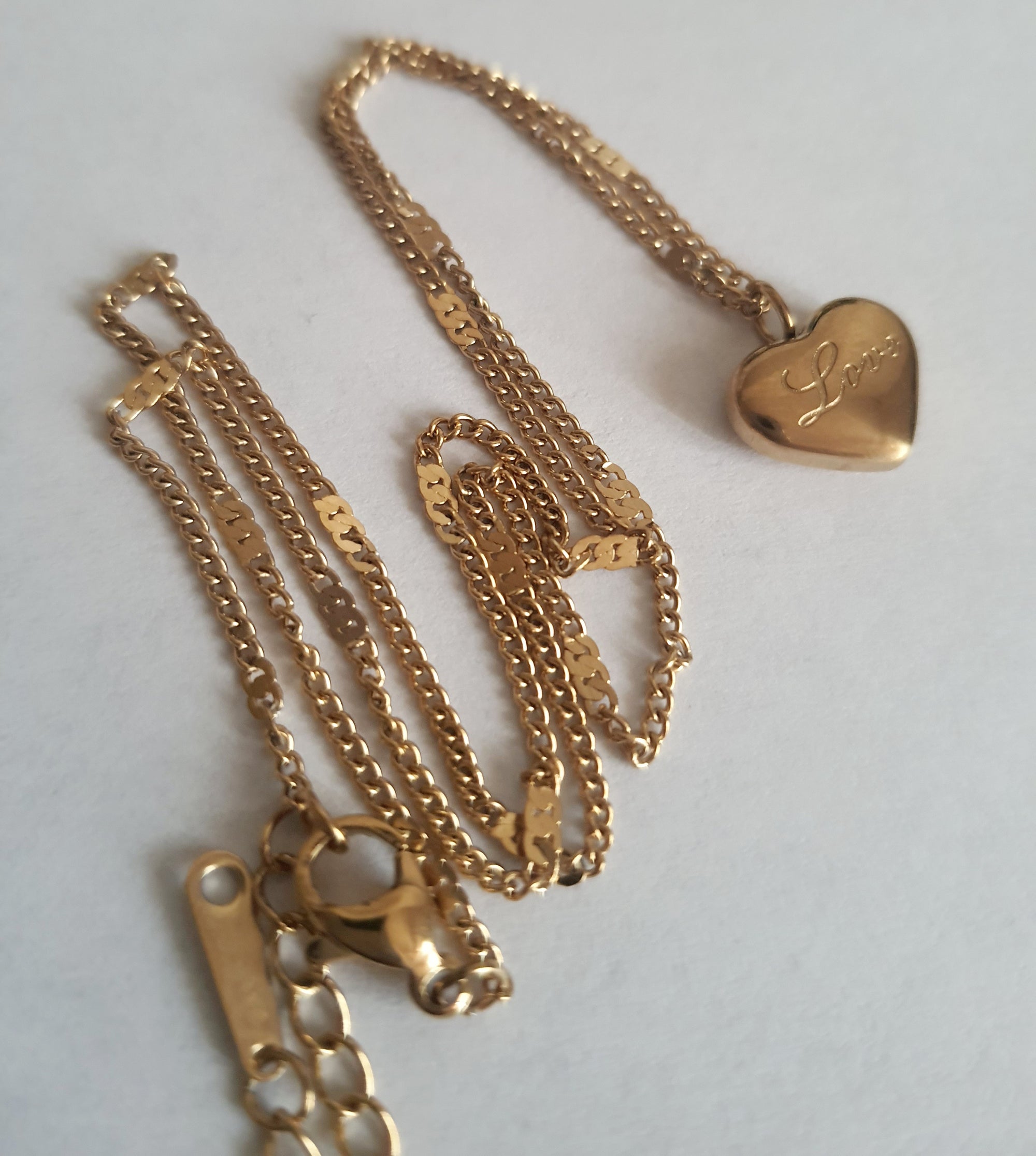 Rose Cross – Gold necklace with pink crystals and a Mary medallion
