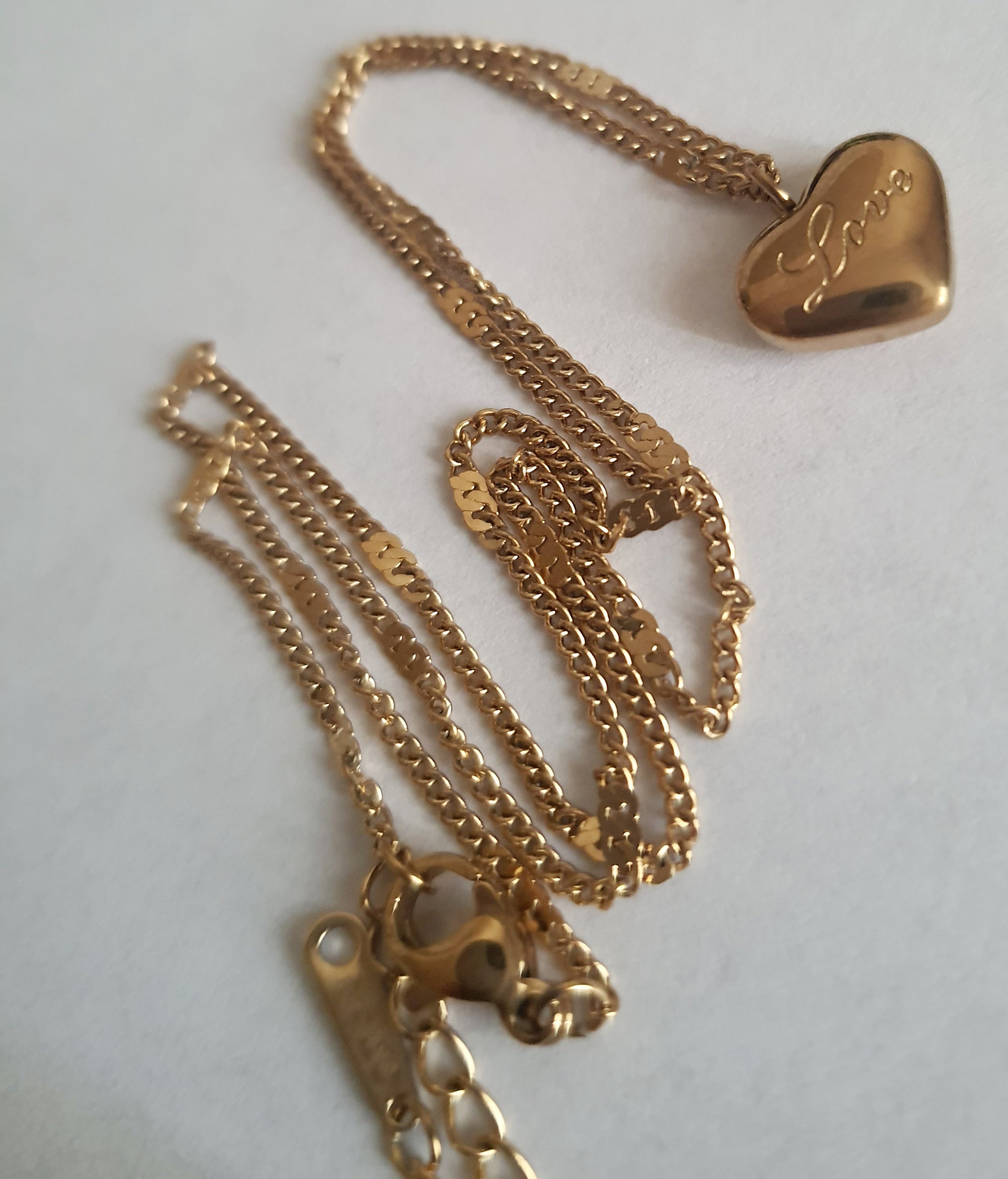 Rose Cross – Gold necklace with pink crystals and a Mary medallion