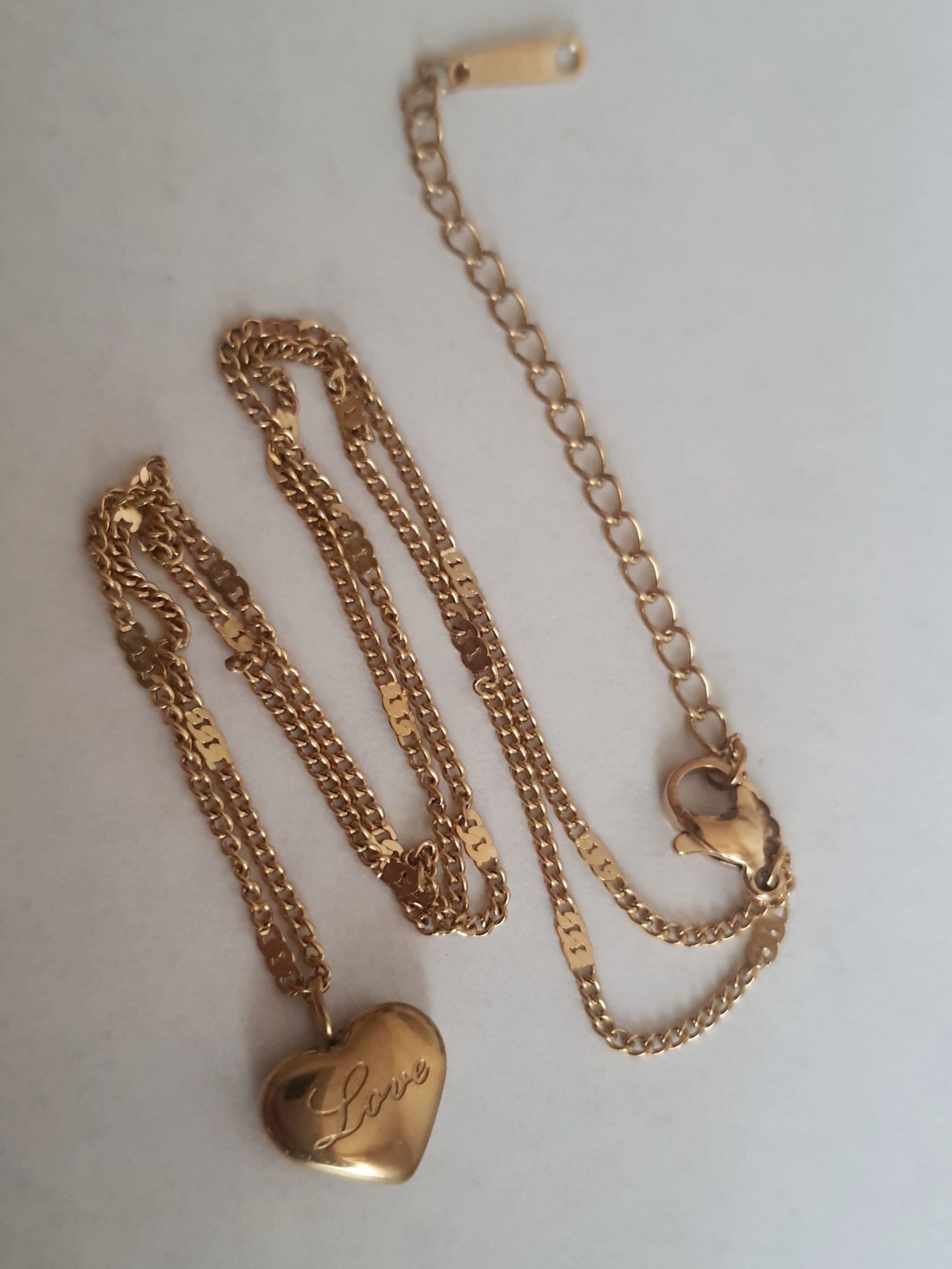 Rose Cross – Gold necklace with pink crystals and a Mary medallion