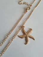 Rose Cross – Gold necklace with pink crystals and a Mary medallion