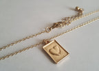Rose Cross – Gold necklace with pink crystals and a Mary medallion