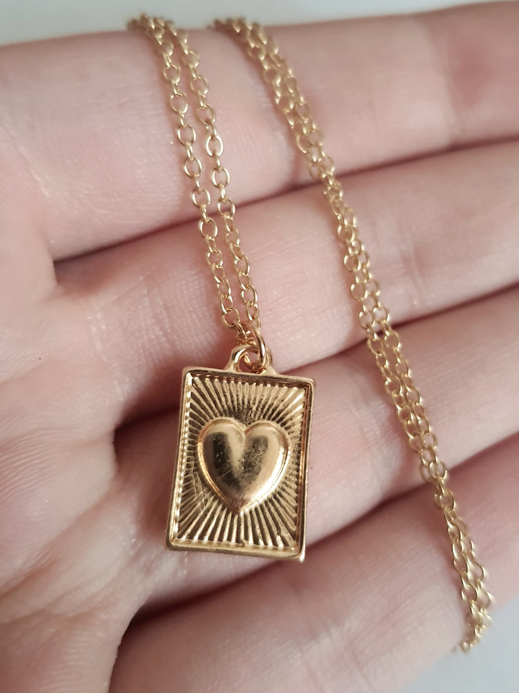 Rose Cross – Gold necklace with pink crystals and a Mary medallion