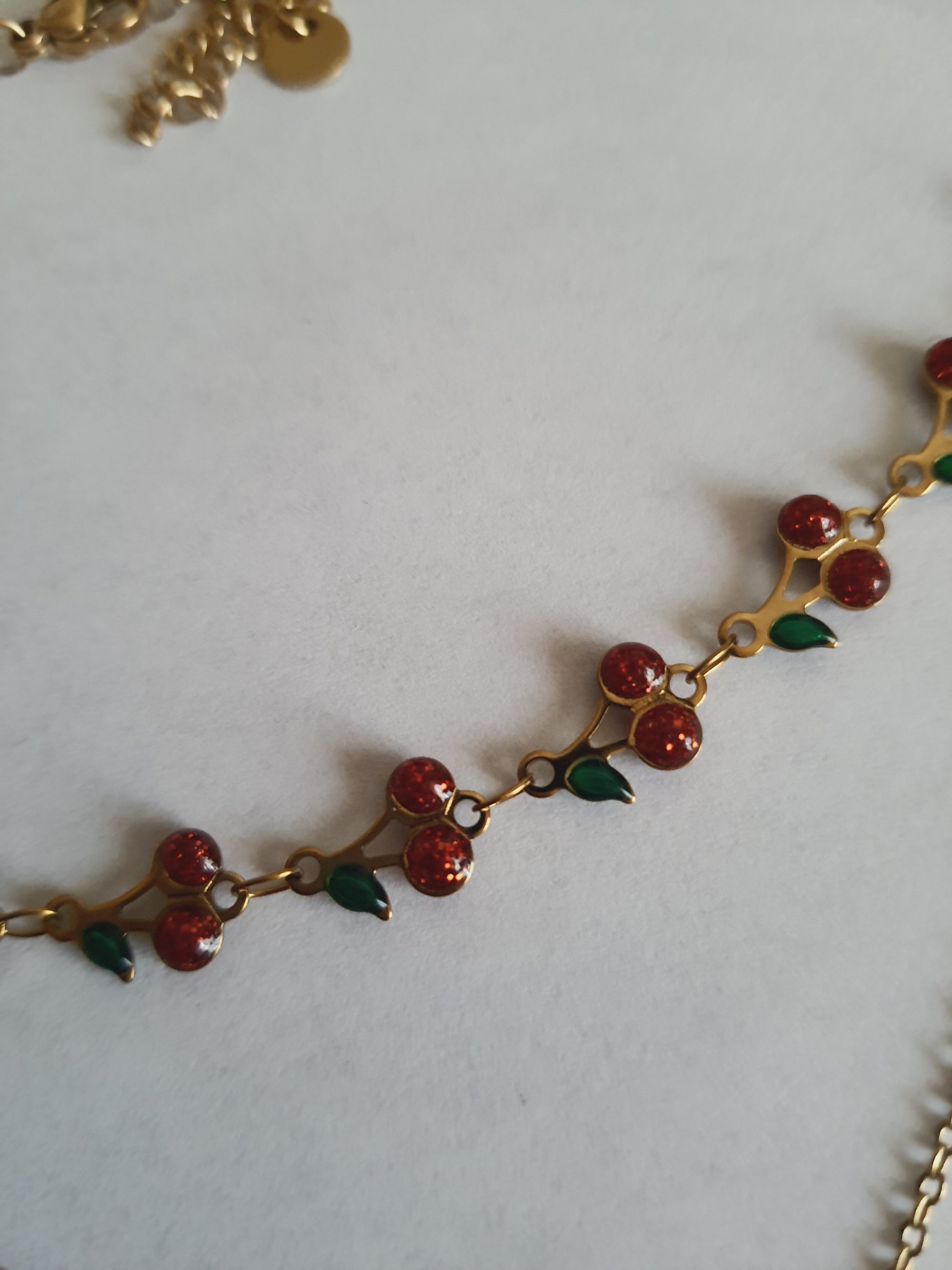 Rose Cross – Gold necklace with pink crystals and a Mary medallion