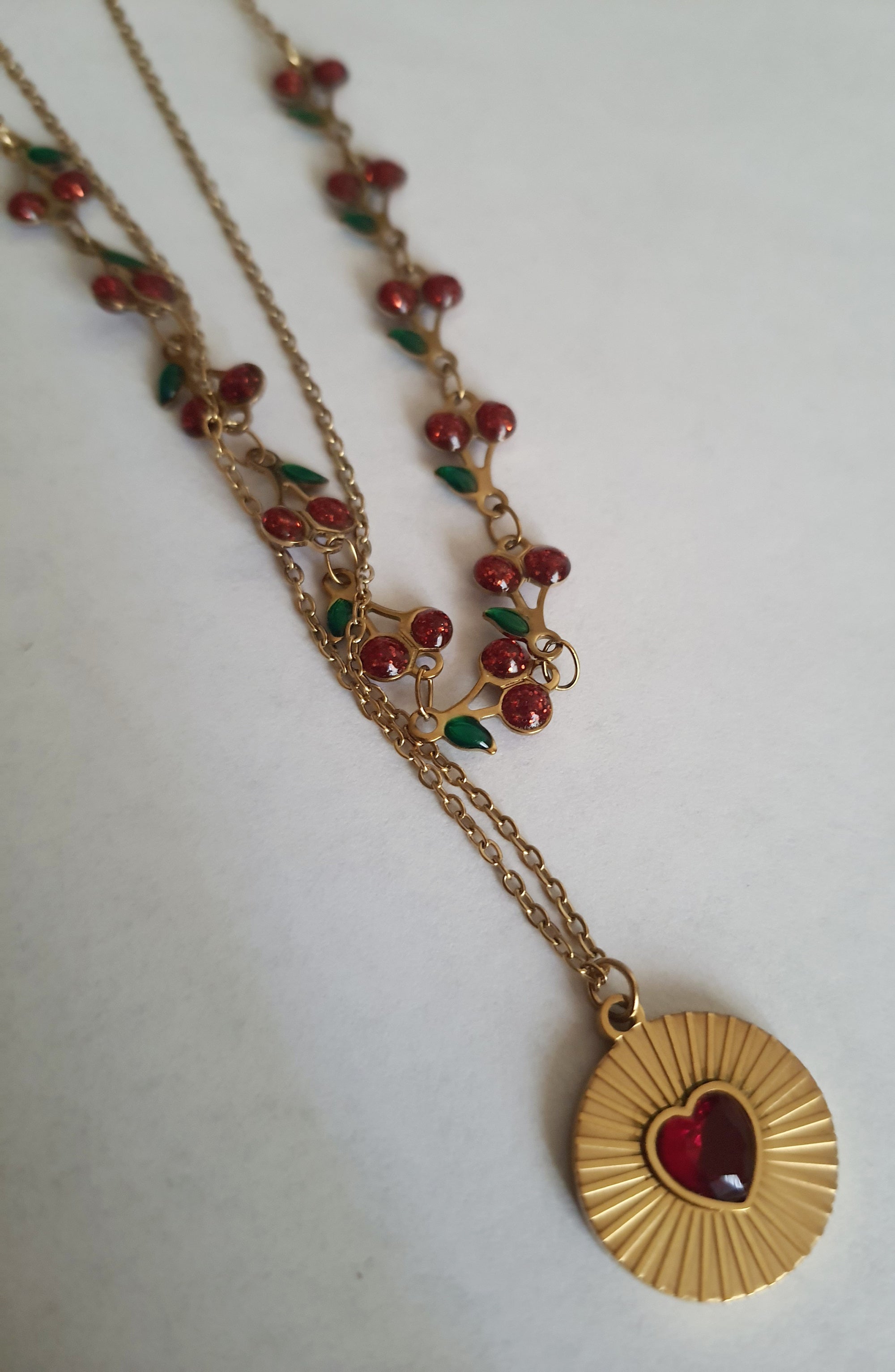 Rose Cross – Gold necklace with pink crystals and a Mary medallion