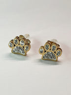 Złote kolczyki w kształcie psich łapek z przezroczystymi cyrkoniami, średnica 1 cm, stal chirurgiczna, stal nierdzewna, wodoodporne, hipoalergiczne, jakość premium, elegancki styl, Rouge Bizu.