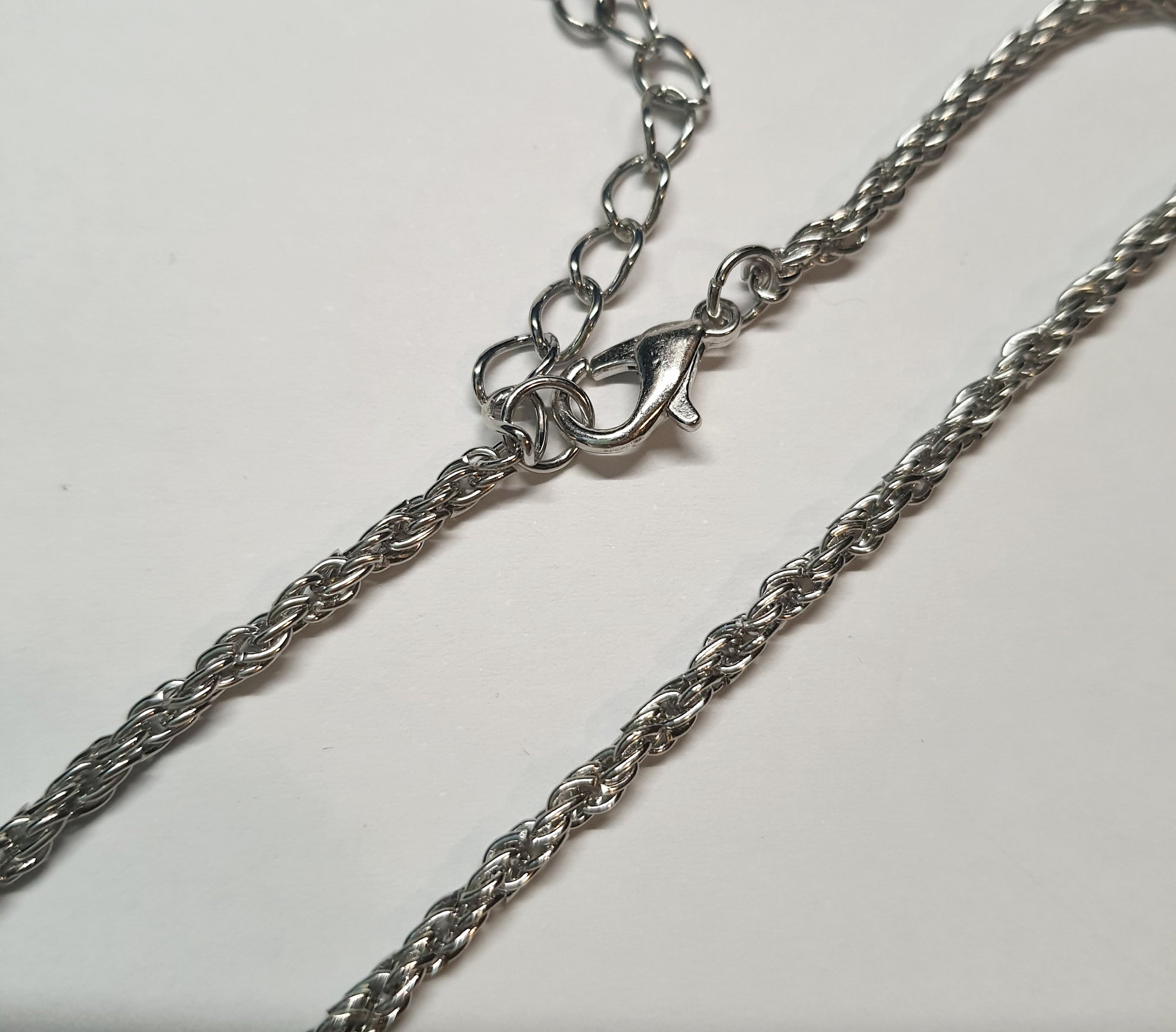 Srebrna bransoletka o splocie kordel, stal chirurgiczna, stal nierdzewna, wodoodporne, hipoalergiczne, jakość premium, długość regulowana 21–28 cm, RougeBizu.