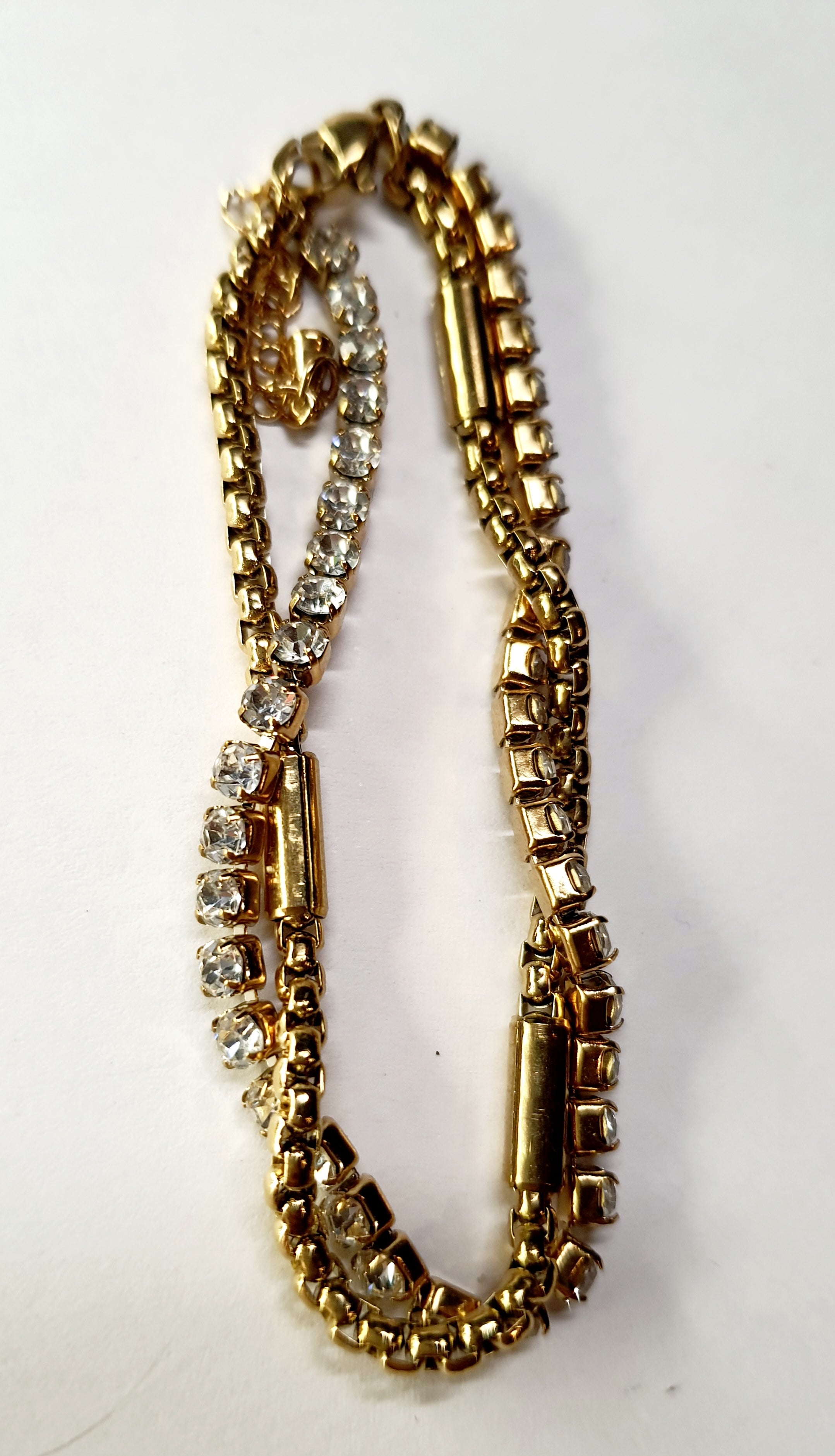 Złota podwójna bransoletka z cyrkoniami, długość regulowana 17–21 cm, styl glamour i elegancki. Stal nierdzewna, stal chirurgiczna, wodoodporne, hipoalergiczne, jakość premium, Rouge Bizu.