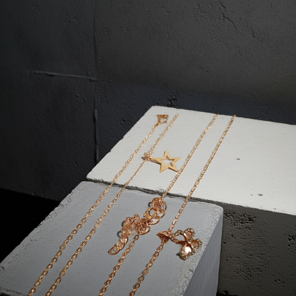Złoty zestaw dwóch łańcuszków z zawieszką gwiazdki i motylka, biżuteria z regulacją | RougeBizu
