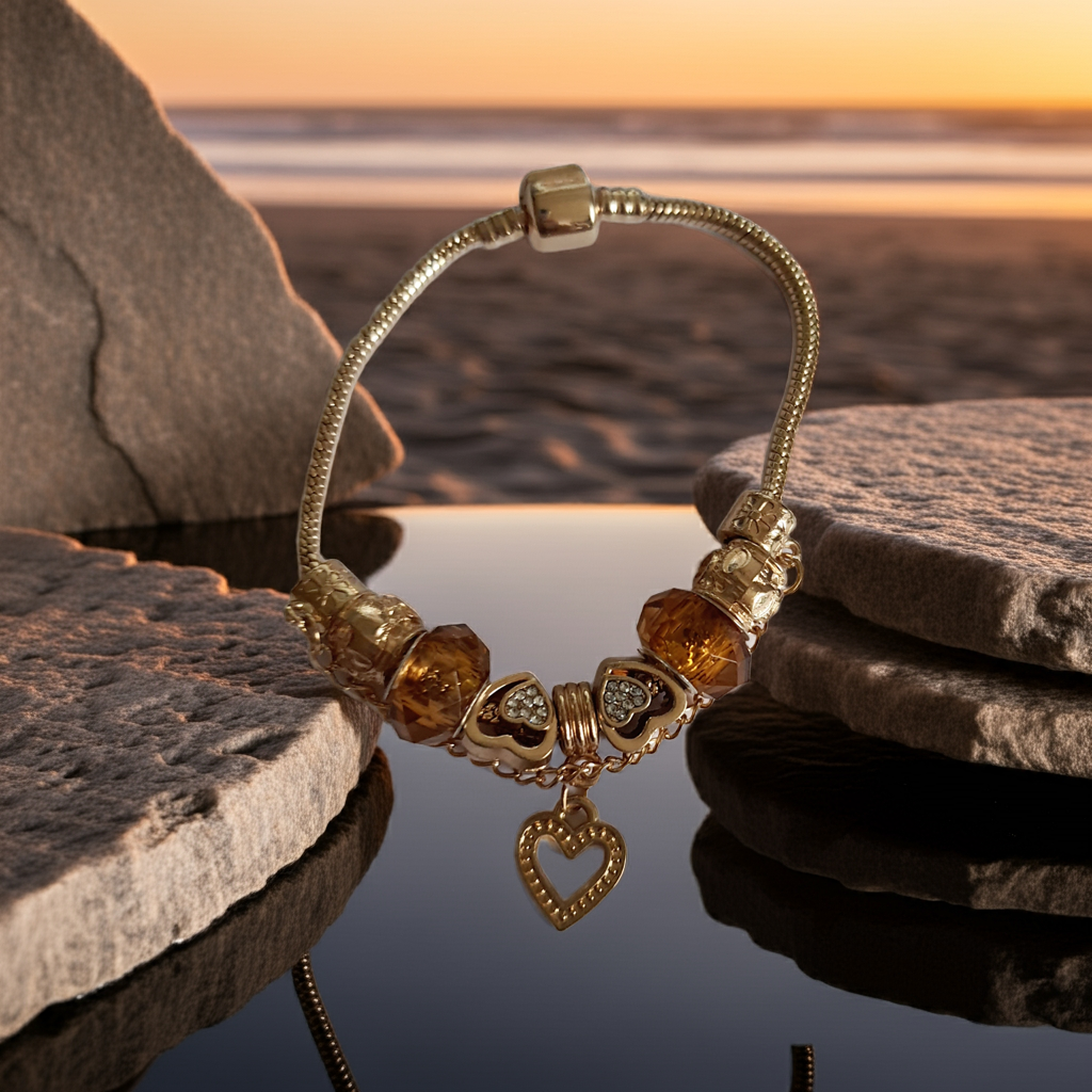 Przepiękna bransoletka stal nierdzewna z charmsami w pięknym, ciepłym bursztynowym kolorze. kolor wyrobu ciepłe złoto. charmsy z blokadą, wyjątkowo śliczny i elegancki wyrób. stal nierdzewna. rougebizu