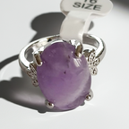 Lavender Kiss – a ring with a subtle stone and a lace setting