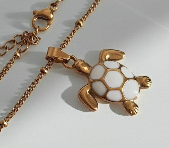 Rose Cross – Gold necklace with pink crystals and a Mary medallion