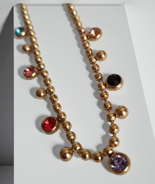 Rose Cross – Gold necklace with pink crystals and a Mary medallion