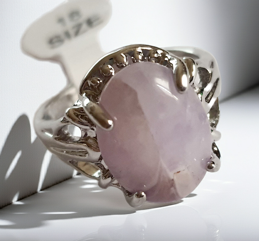 Misty Dawn – a ring with a cool stone and a carved setting