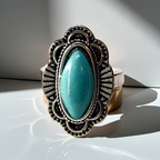 Pierścionek srebrny z owalnym turkusowym kamieniem w ozdobnej oprawie, styl boho vintage, stal nierdzewna, stal chirurgiczna, rozmiar 15 mm, wodoodporne, hipoalergiczne, jakość premium, Rouge Bizu.