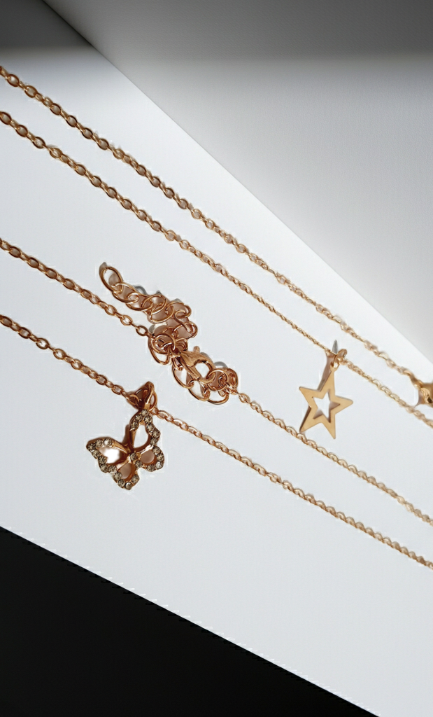 Złoty zestaw dwóch łańcuszków z zawieszką gwiazdki i motylka, biżuteria z regulacją | RougeBizu
