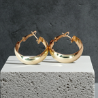 Gold twisted earrings 1.8 cm – a delicate form with character