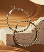 Gold twisted earrings 1.8 cm – a delicate form with character