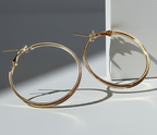 Gold twisted earrings 1.8 cm – a delicate form with character