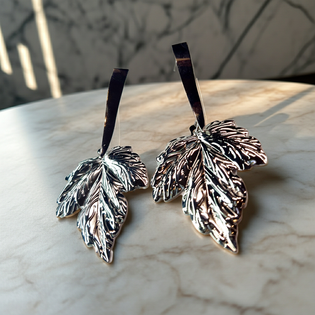 Kolczyki liście w kolorze srebrnym