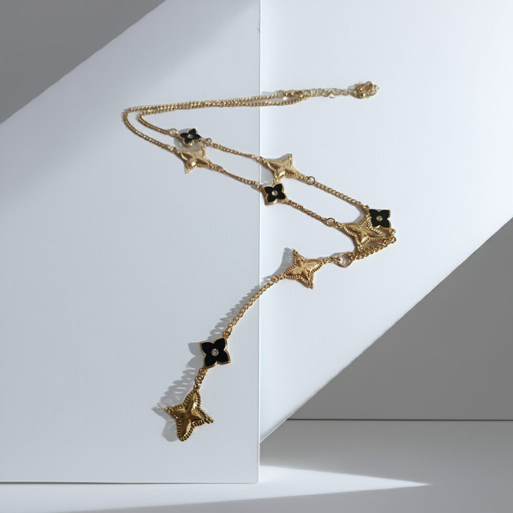 Naszyjnik złoty 58–65 cm ze stali nierdzewnej, zdobiony naprzemiennymi złotymi i czarnymi kwiatami z kryształkami, elegancki glamour, Rouge Bizu.